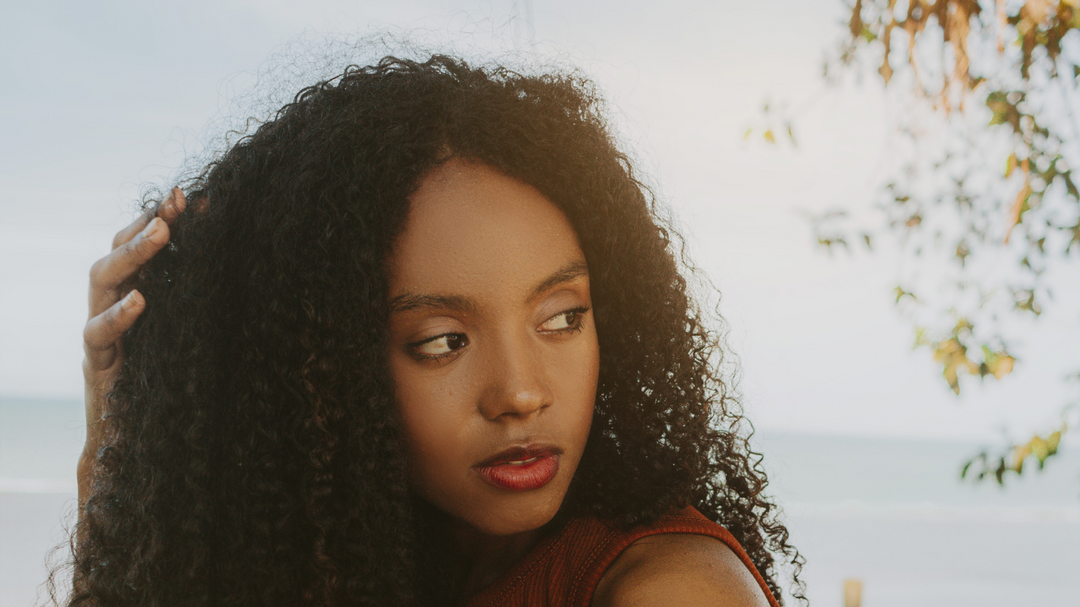 Beyond Sunscreen: Why Jamaican Black Castor Oil Could Be Your Scalp's Summer Savior